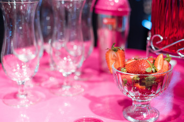 Alcohol bar, cocktail glass on bar counter, cocktail glass in a bar, Drinking cocktail in bar, cocktail in the glass with straws, Fresh drink coctail on a color background