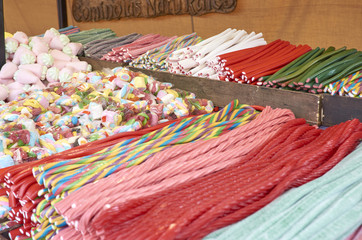 Various colorful sugar candy on a market in Valencia. Sweet
