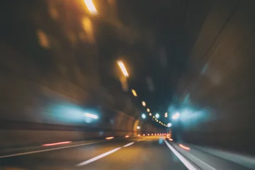 Cercles muraux Tunnel Tunnel de voiture flou avec lumières, arrière-plan flou de mouvement, virage à droite