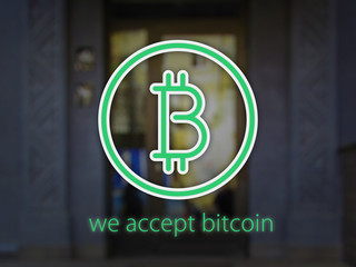 Logo Bitcoin over facade with blur effect and text we accept bitcoin. 3D illustration