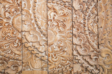 Pattern of flower carved on wood background