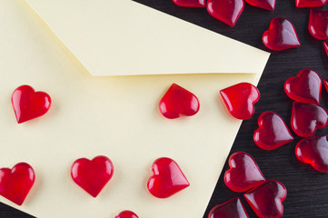 Symbol of a heart on a table and a box with message