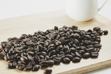 Coffee beans on wood background