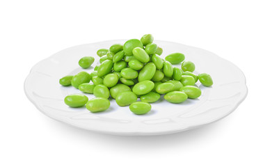 green soybeans  in plate on white background