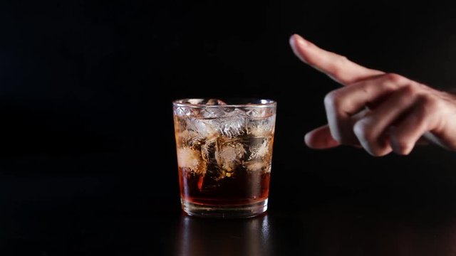 Stop drinking gesture. A hand forbid to take glass with alcohol.