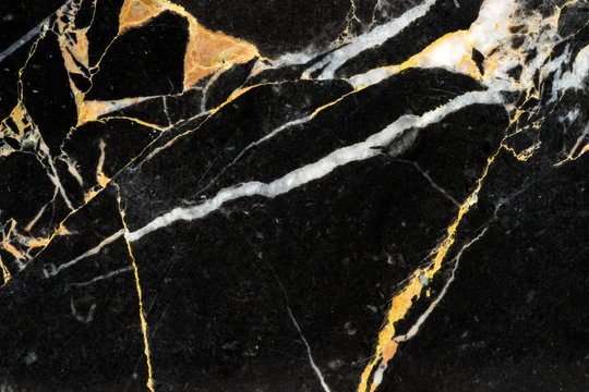 golden black marble abstract pattern texture