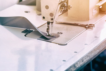 Closeup of workplace seamstress.
