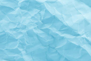 Blue crumpled paper  surface