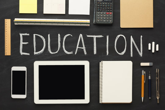 Word education written with chalk on blackboard