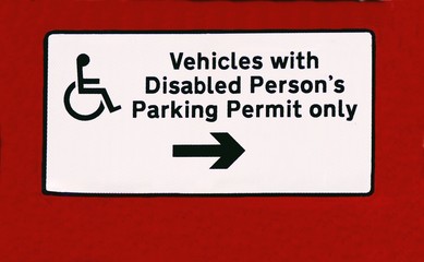 verchiels with disabled person's parking permit only sign