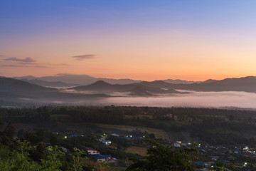 Sunrise with fog in early morning on the top of the hill at yun lai viewpoint, pai, thailand.