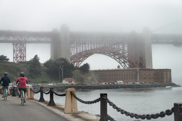 Golden Gate bridge base shrouded by fog, San Francisco