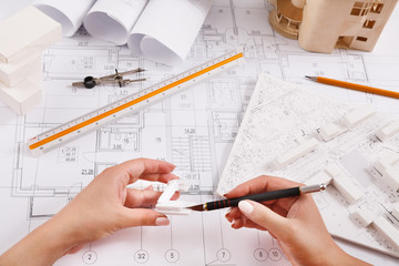 Architect making architectural project top view