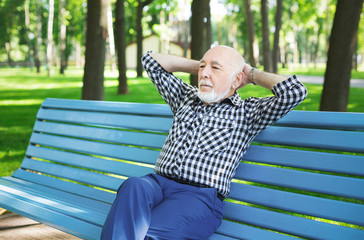 Relaxed senior man outdoors