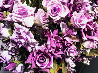 Rose fake flower and Floral background. rose flowers made of fabric. The fabric flowers bouquet. Colorful of decoration artificial flower