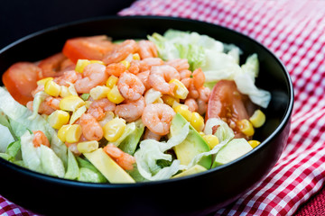 Delicious fresh salad and olive oil