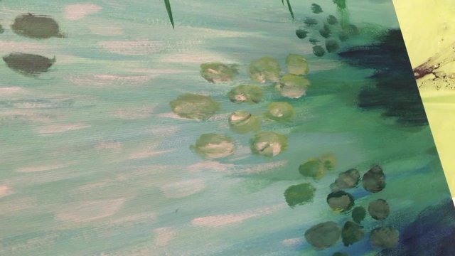 Painting highlights on green lily pads in Impressionist Style