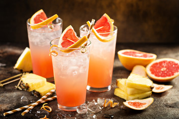 Grapefruit and pineapple cocktail - obrazy, fototapety, plakaty