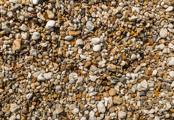 gravel stone background. natural texture sea coast travel holidays