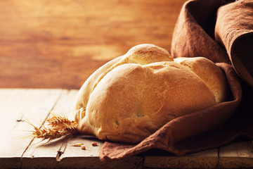 Traditional Italian bread on wooden table. Copy space.