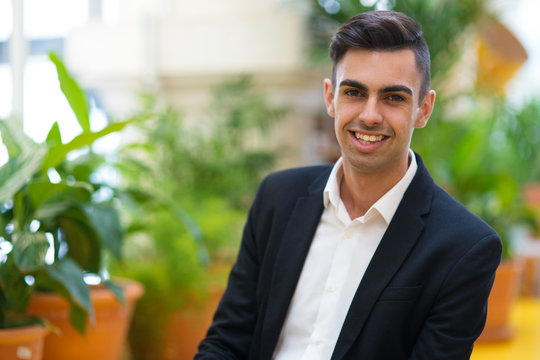 Optimistic young intern confident in himself