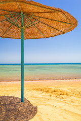 Parasol on the beach of Red Sea in Hurghada, Egypt