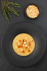 Beans vegetarian soup with bacon and croutons