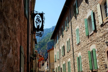 Fototapeta na wymiar A pretty street in the pretty walled town of Villfranche de Conflent in the south of France. This medieval city dates back to the 11th century
