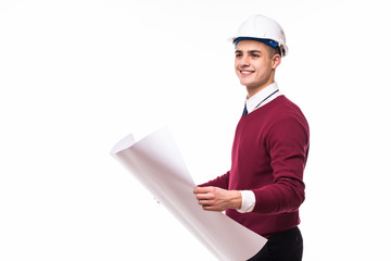 Full length of confident young bussinessman architect with blueprint on white background