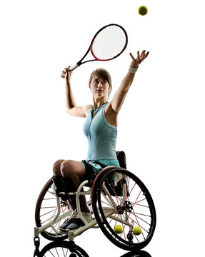 one caucasian young handicapped tennis player woman in welchair sport  tudio in silhouette isolated on white background