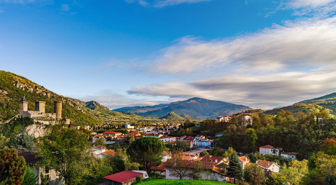 View to old medieval castle and beautiful autumnal valley, sunset, Foix