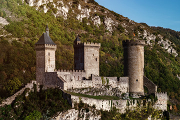 View to old medieval castle and beautiful autumnal valley, sunset, Foix