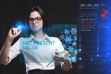 The concept of business, technology, the Internet and the network. A young entrepreneur working on a virtual screen of the future and sees the inscription: Net present value