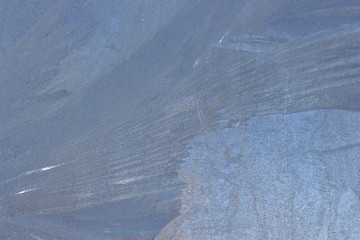 stains of frozen water vapor on the window