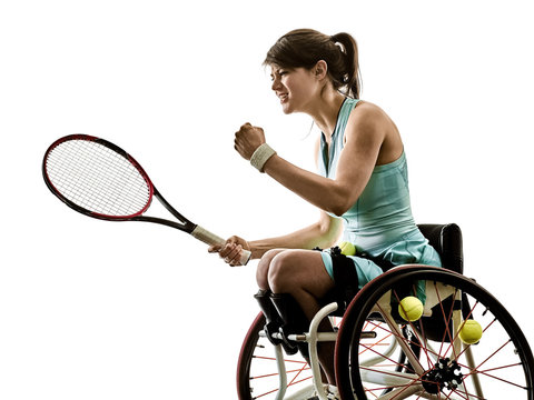 one caucasian young handicapped tennis player woman in welchair sport  tudio in silhouette isolated on white background