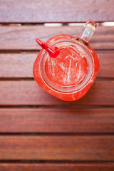 Top view of red cocktail fresh drink.