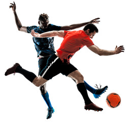 Fototapeta premium two soccer players men in studio silhouette isolated on white background