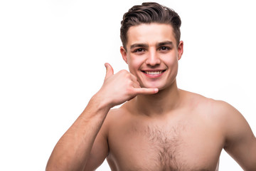 Cheerful handsome undress man gesturing and asking to call him isolated on white background
