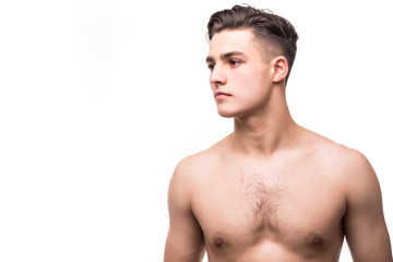 Portrait of a sexy young man with muscular body posing at studio. White background. Men's health.