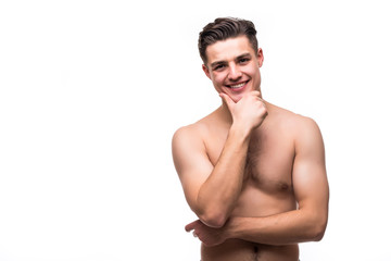 Portrait of young handsome shirtless man with health clean skin touching his chin isolated on white background