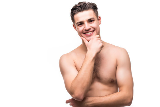 Portrait of young shirtless handsome man with health clean skin touching his chin isolated on white background