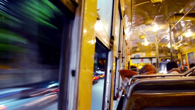 Bangkok, Thailand. Riding a city bus at night in Bangkok, Thailand. Time-lapse with motion blurred street