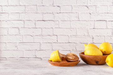 Lemons and juicer for making lemon juice.