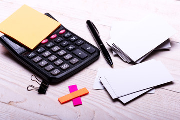 Business idea. Stationery and calculator. Business cards with copy space