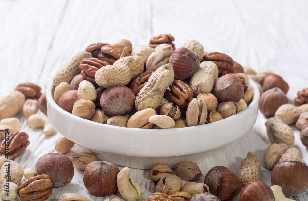 Wall mural mix of nuts in plate