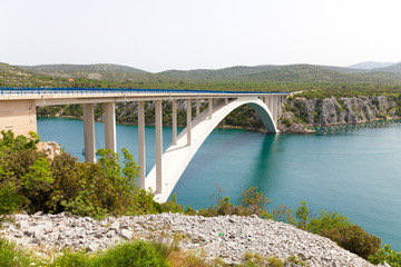 Fototapeta na wymiar bridge over the sea strait in Croatia