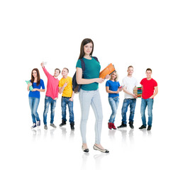 Obraz premium Large group of teenage students isolated on white background. Many different people standing together. School, education, college, university concept.