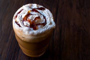 Iced Coffee Caramel Frappe / Frappuccino with Whipped Cream and Caramel Syrup.