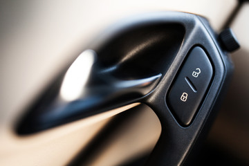 Door lock button in a car