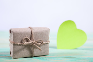 Pile parcel wrapped with brown kraft paper and tied with twine